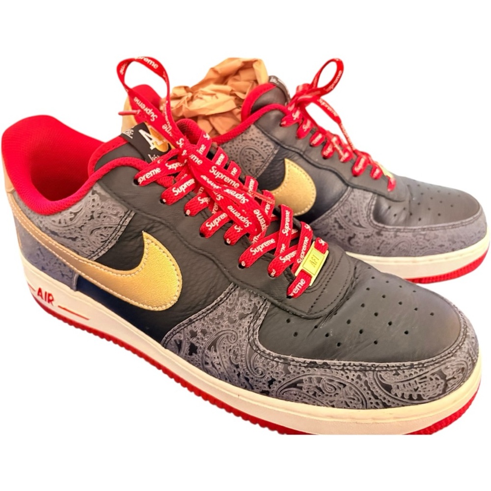 Nike Gold and Black Sneakers with Iconic Style